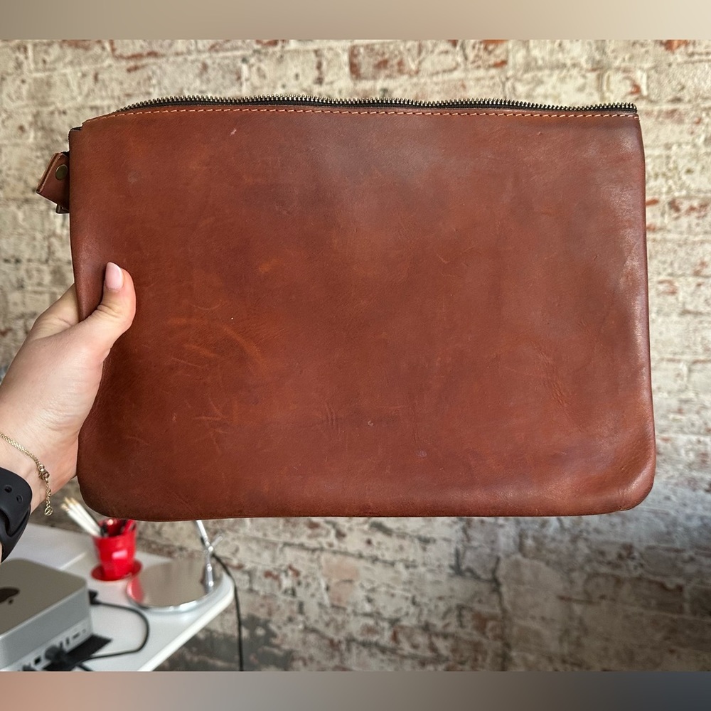 Leather zipper sleeve clutch